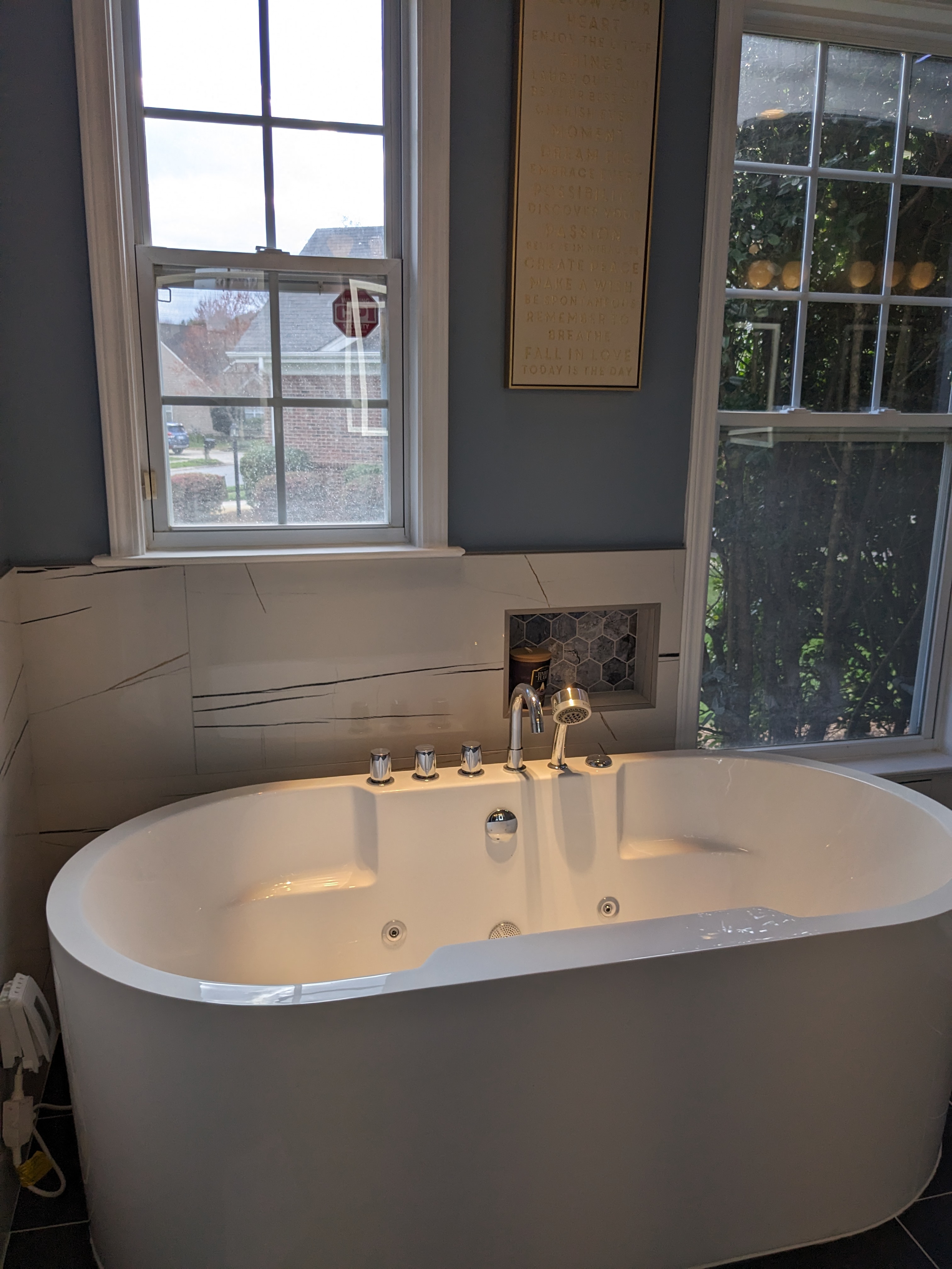 Completed bathroom with freestanding tub