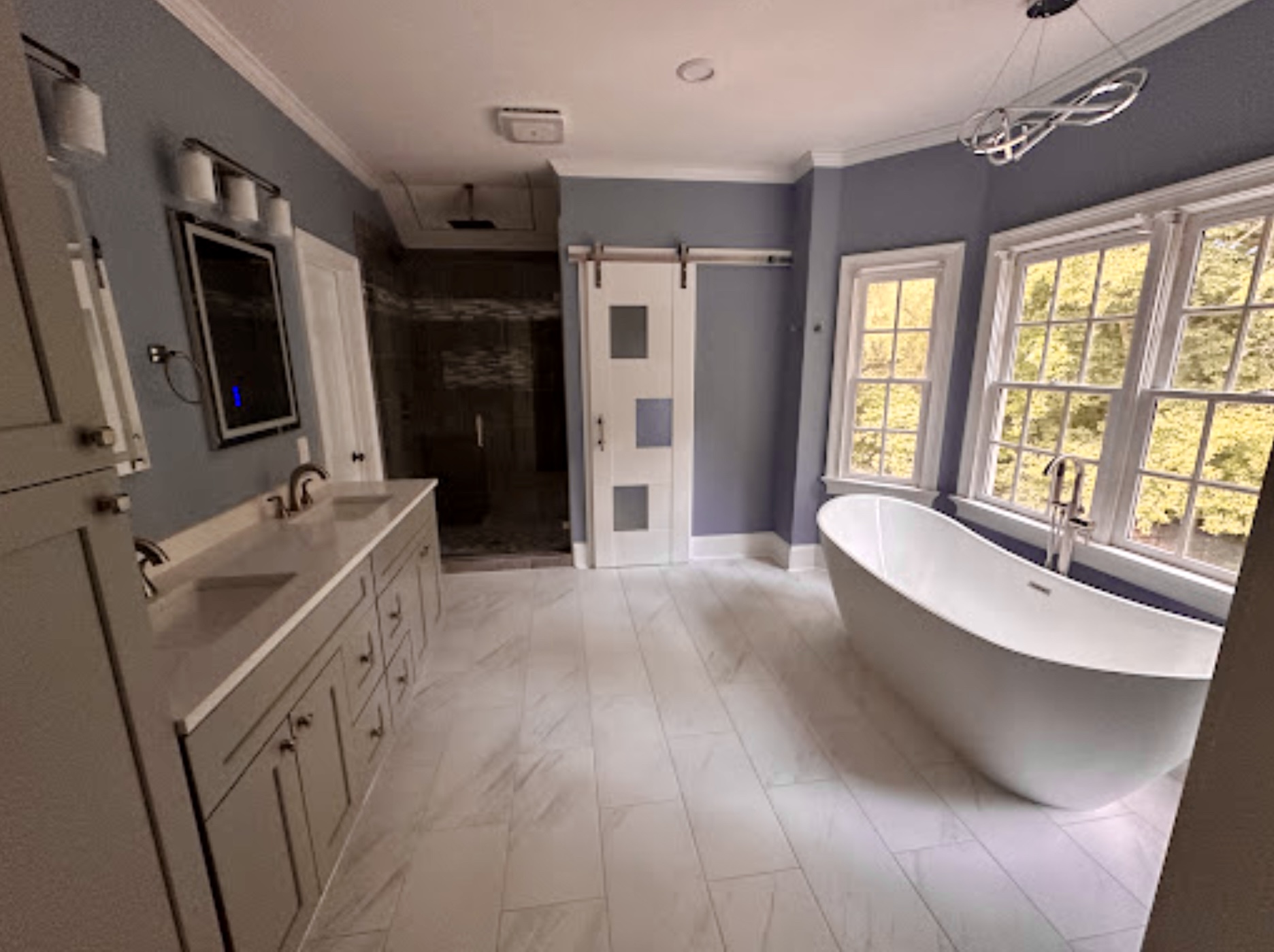 Bright, finished bathroom from a Metrolina Remodel project