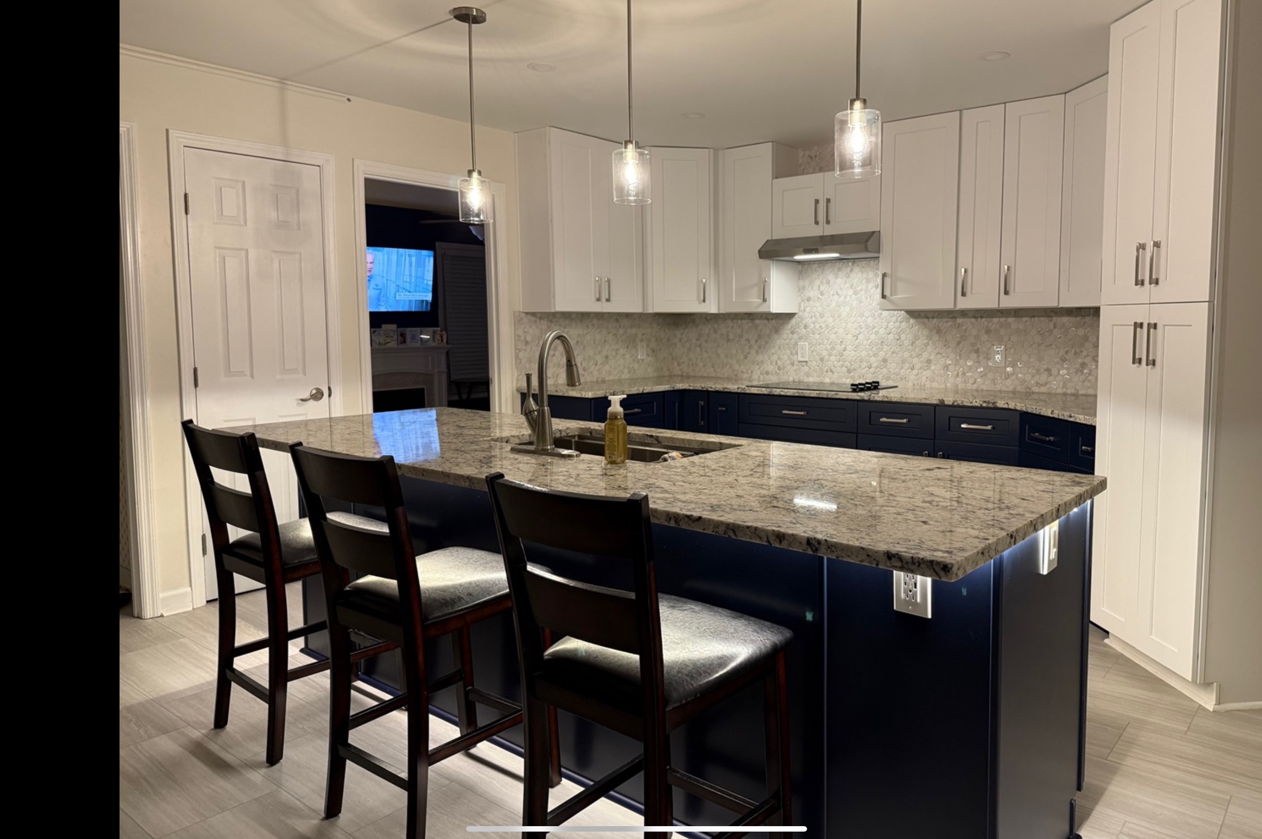 Finished kitchen with contrasting cabinetry