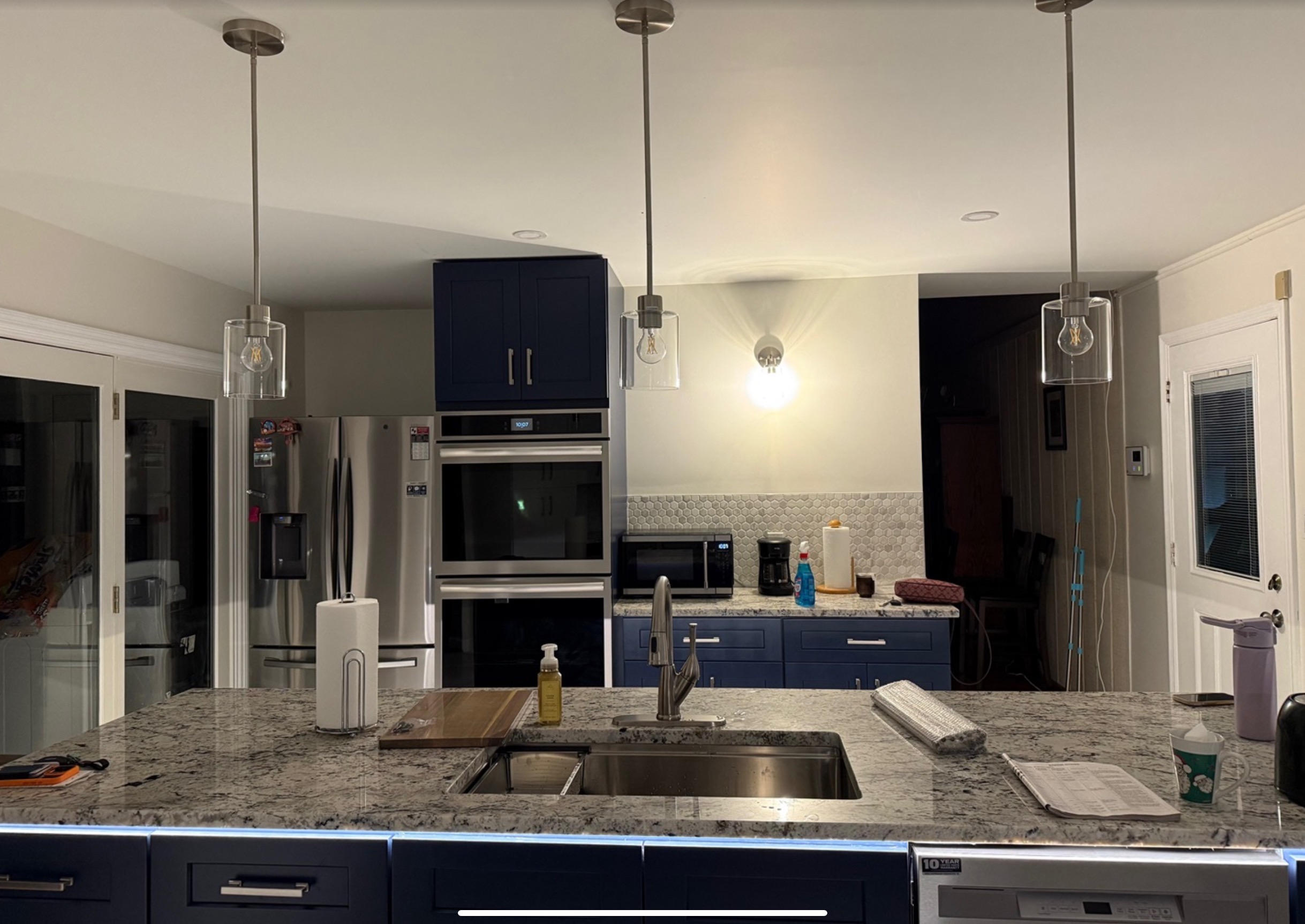 Completed custom kitchen with navy island
