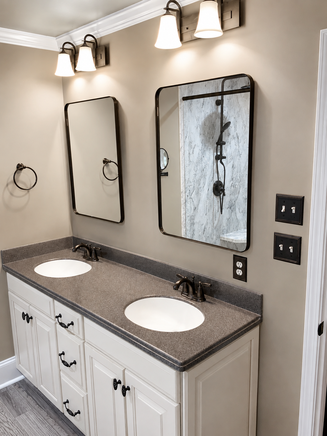 Finished bathroom vanity with detailed fixtures